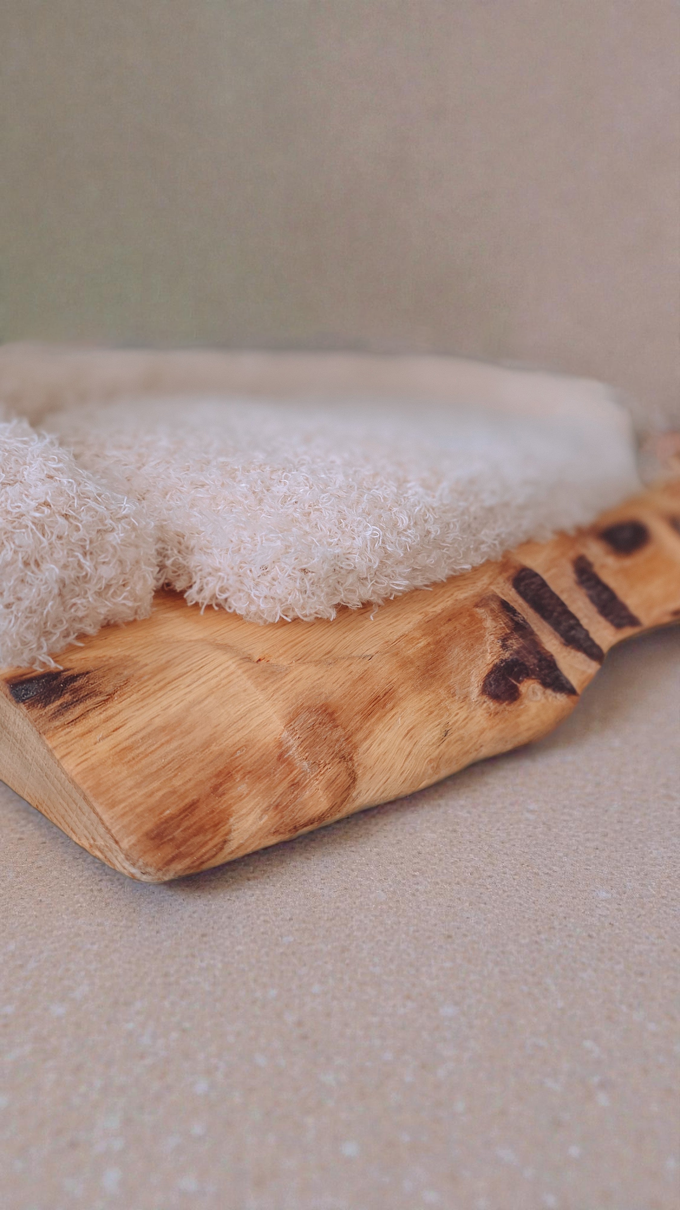 solid oak pet bed with fluffy boucle fabric