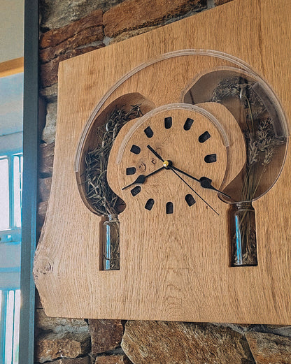 Wooden wall clock with decorative elements on a stone wall background